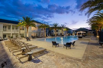 Beautiful Pool & Sundeck Glowing At Night